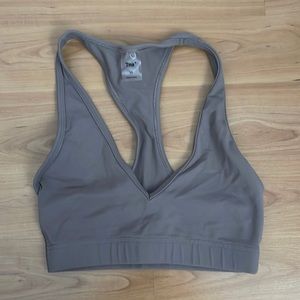 Aritzia TNA butter sports bra in taupe